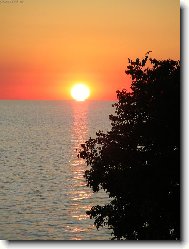 západ slunce nad hladinou