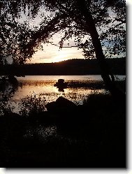 Západ nad rybníkem